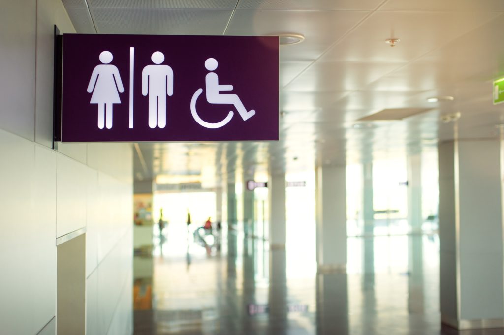 frequent urination bathroom sign