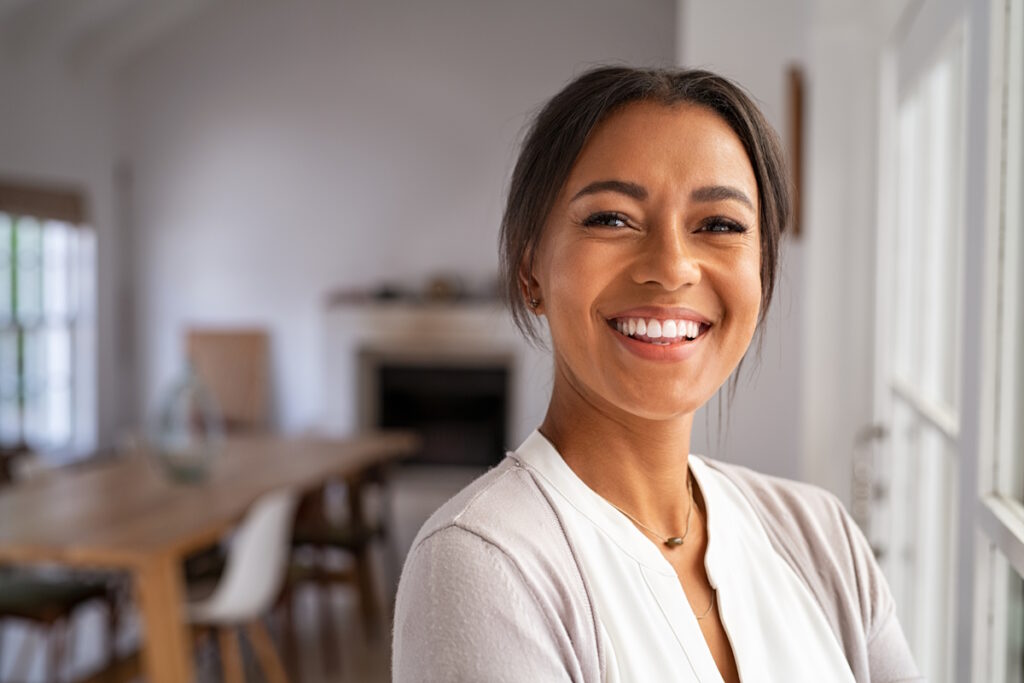 fibroid symptoms smiling happy patient
