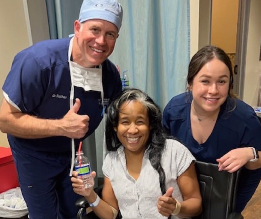 find right fibroid doctor Houston fibroid doctor Fischer with happy patient
