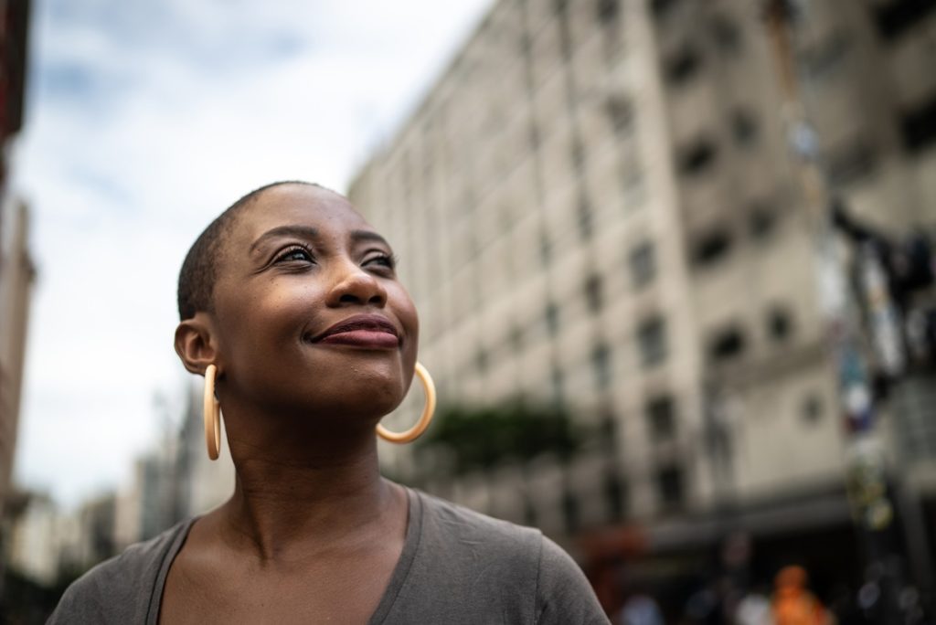 fibroid treatment uterine fibroids thinking smiling woman