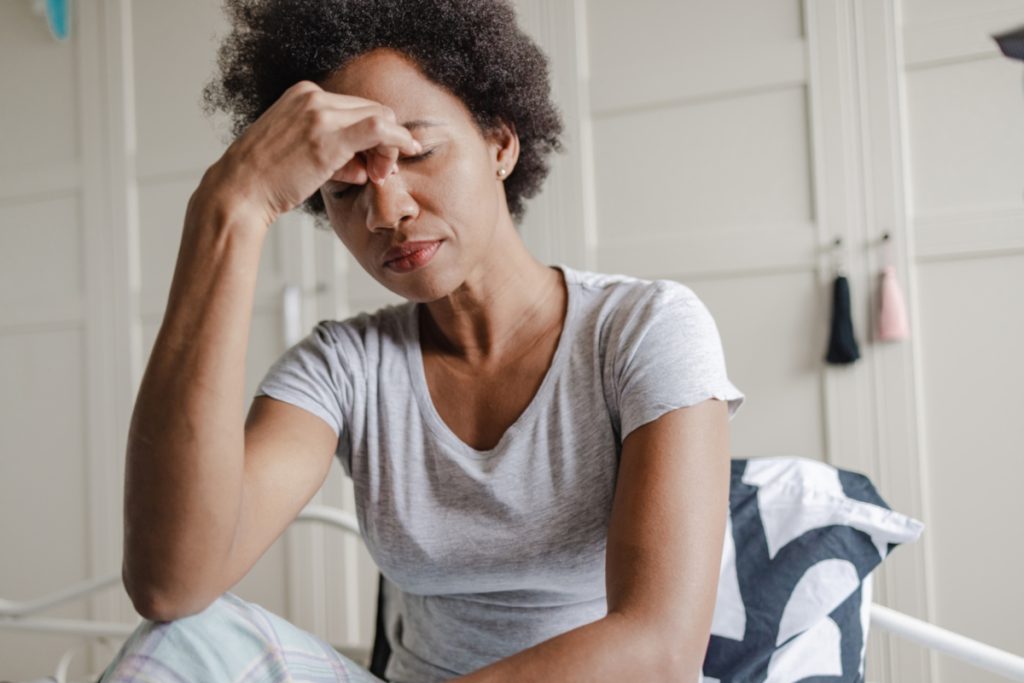 fibroid treatment pain tired woman